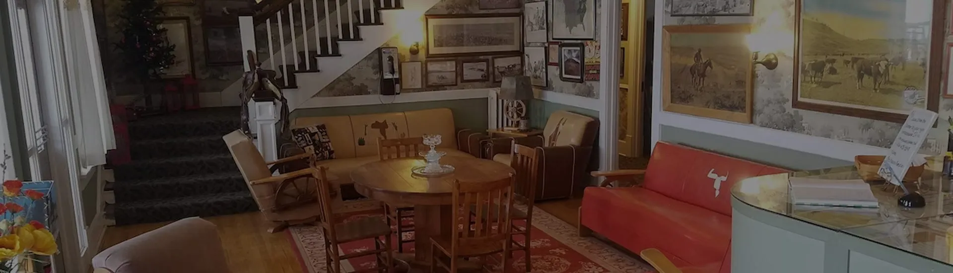 The Kempton lobby, with its staircase, round table and walls of framed art